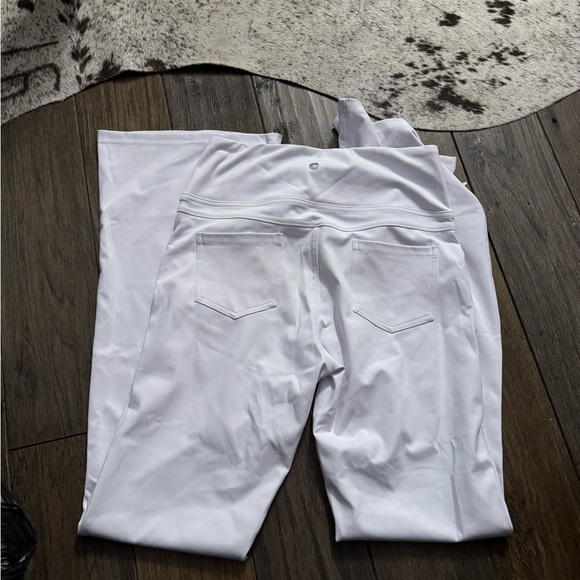 65. Halara High Waisted Back Pocket Flare Yoga Leggings in White - Picture 4 of 4